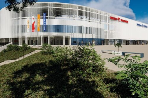 Nowoczesny stadion z logo i flagami