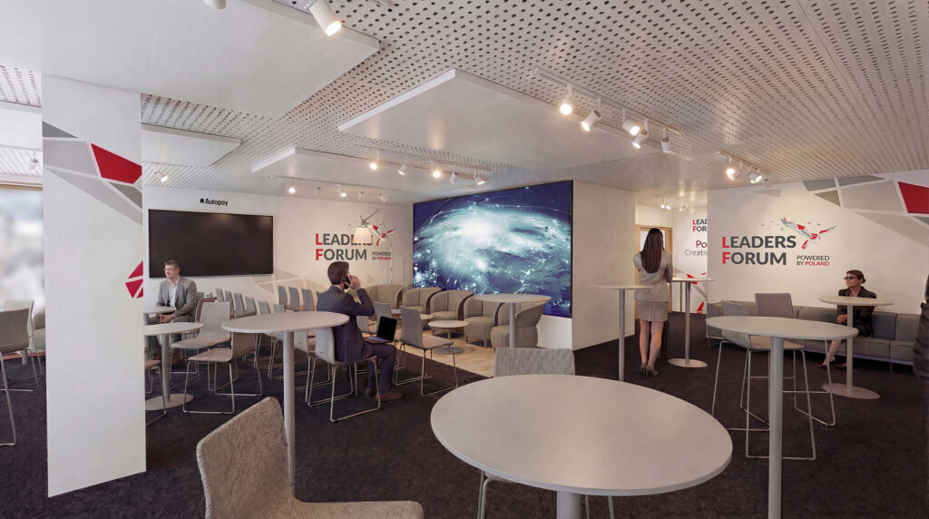 Wnętrze sali konferencyjnej Leaders Forum z ekranem.